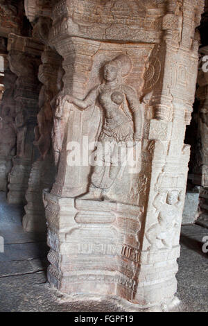 Intricately sculpted pillars inside the Veerabhadra Swamy Temple at Lepakshi, in Andhra Pradesh, India Stock Photo