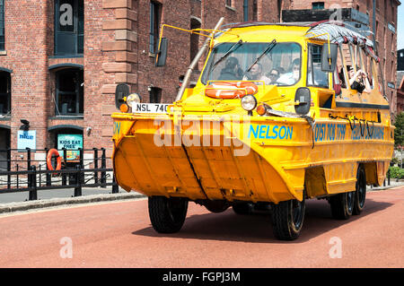 The ' yellow duckmarine ' a tourist sightseeing amphibious vehicle at the Albert Dock in LIverpool, UK. Stock Photo