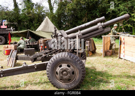 War and Peace show, England. Vietnam war re-enactment. American 105mm howitzer gun set up in mock-up fire support base. Stock Photo