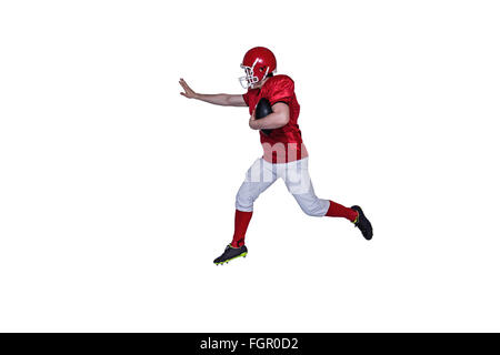 American football player running with the ball Stock Photo