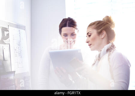 Interior designers using digital tablet in office Stock Photo