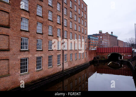 Manchester, UK - 17 February 2016: The Great Ancoats Street bridge on the Rochdale Canal and industrial architectural heritage Stock Photo