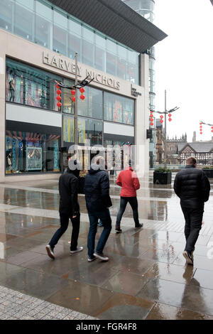 Manchester, UK - 17 February 2016: Rain on New Cathedral Street with its Harvey Nichols store Stock Photo