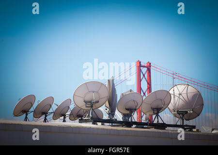 Modern communications satellite dishes, for Technology and global world information worldwide Stock Photo