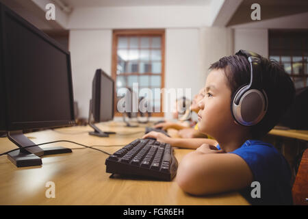Cute pupils in computer class Stock Photo
