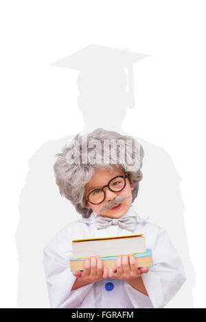 Composite image of dressed up pupil holding books Stock Photo