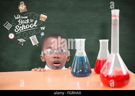 Composite image of pupil doing science experiment Stock Photo