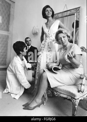 fashion, 1960s, evening fashion, young woman trying on a long evening dress, 1960s, Additional-Rights-Clearences-Not Available Stock Photo