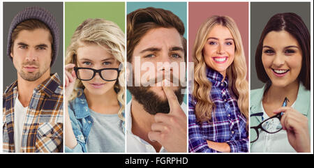 Composite image of woman holding glasses Stock Photo