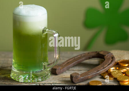 St. Patrick's Day green beer and horseshoe abstract background Stock Photo