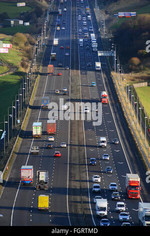 heavy traffic travelling on the m62 near moss moor huddersfield yorkshire uk Stock Photo