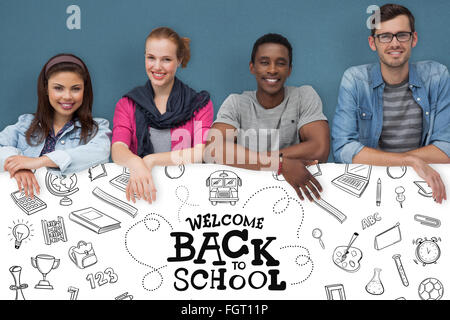 Composite image of portrait of happy young friends with blank board Stock Photo