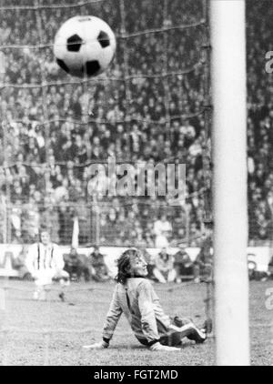 sports,football,game,Germany,national league,season 1972/ 1973,25th match day,game Borussia Moenchengladbach versus FC Bayern Muenchen(4: 2),Boekelbergstadion,17.3.1973,goal keeper Wolfgang Kleff on the ground during 3: 0 for Munich,Boekelberg,sports stadium,sports stadiums,football stadium,soccer stadium,football stadiums,soccer stadiums,nets,goal net,football match,soccer match,football matches,footballer,footballers,kicker,football player,football players,ball,playing,play,West Germany,Western Germany,Germany,1970s,70s,20,Additional-Rights-Clearences-Not Available Stock Photo