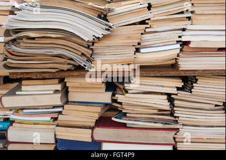 Old antique used books in second hand bookstore Stock Photo
