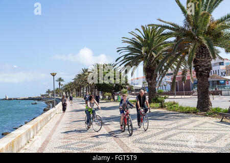 Cycling on promenade, Lagos, Algarve, Portugal Stock Photo