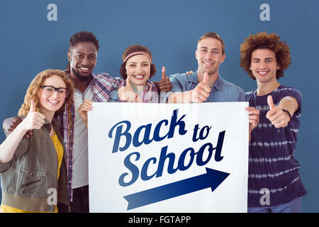 Composite image of fashion students smiling at camera together Stock Photo