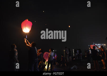 Port Klang, Selangor, Malaysia. 22nd Feb, 2016. Malaysian Chinese light up the flying lantern during Chap Goh Mei celebration in Port Klang outside Kuala Lumpur Malaysia on 22 February 2016. Chap Goh Mei is the final day of Chinese New Year, also known as the Oriental Valentine's Day. Young maidens believed that by throwing mandarin oranges into the sea or a lake or pool would find themselves a good husband. © Kepy/ZUMA Wire/Alamy Live News Stock Photo