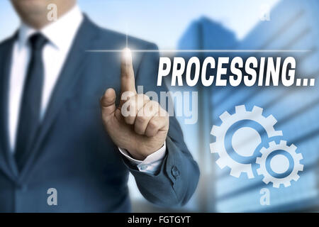 processing browser is operated by businessman. Stock Photo