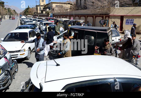 Numerous vehicles are stuck in traffic jam as traffic jam is becoming a routine due to negligence of traffic police staffs at Zarghoon road in Quetta on Monday, February 22, 2016. Stock Photo