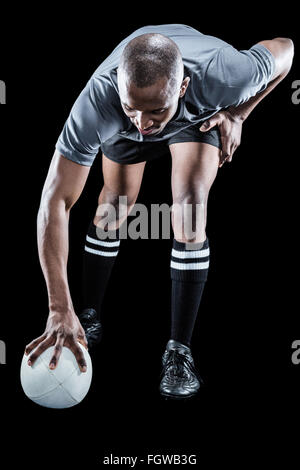 Rugby player taking position Stock Photo - Alamy