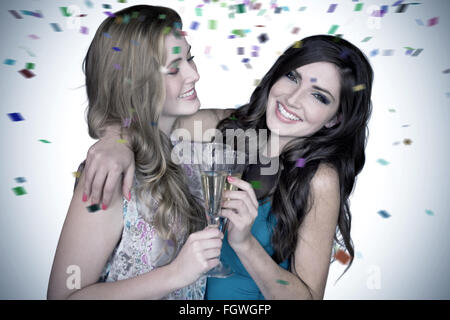 Composite image of friends drinking champagne Stock Photo