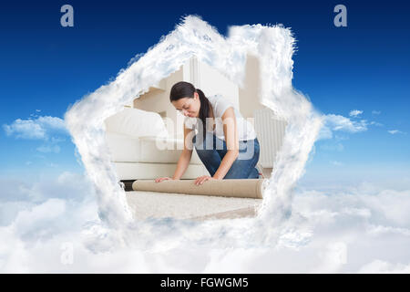 Composite image of two people moving into their house Stock Photo