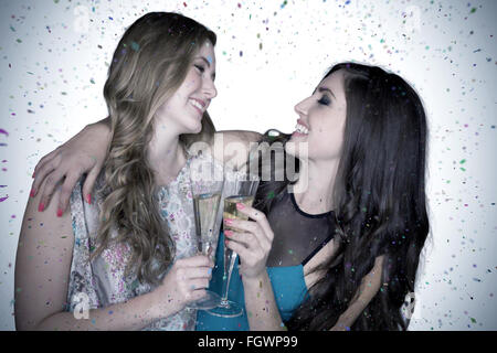 Composite image of friends drinking champagne Stock Photo