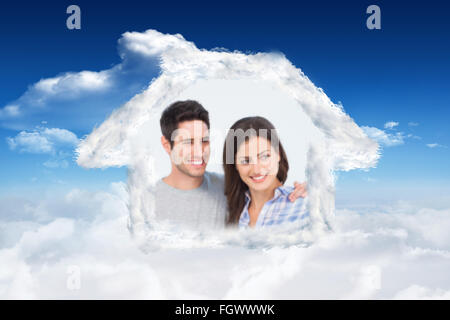 Composite image of woman being given a house key Stock Photo