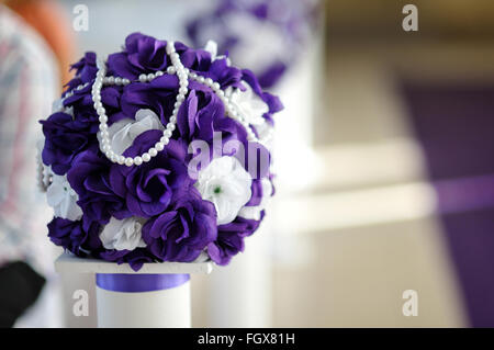 beautiful wedding bouquet of purple and white flowers Stock Photo