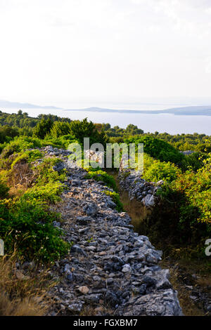 Hvar Island,Ancient Walled holdings,Lukavci,Scedro islands in the mist on approaches to Hvar town below,Dalmatian Coast,Croatia Stock Photo