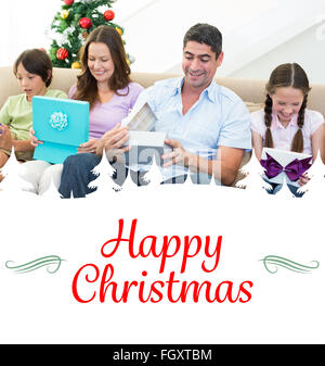 Composite image of family opening christmas gifts Stock Photo