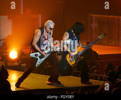 DNIPROPETROVSK, UKRAINE - OCTOBER 31, 2012: Guitarists of the band Scorpions perform live on stage during 'Sting Tour 2012' Stock Photo
