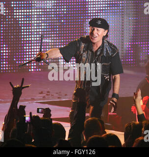 DNIPROPETROVSK, UKRAINE - OCTOBER 31, 2012: Vocalist of the Scorpions band Klaus Meine with microphone on the stage Stock Photo