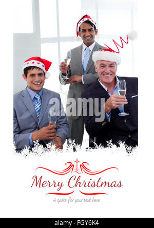 Composite image of confident businessmen wearing novelty christmas hat Stock Photo