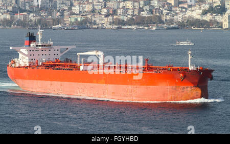 Orange Tanker Ship Passing in Bosphorus Strait Stock Photo