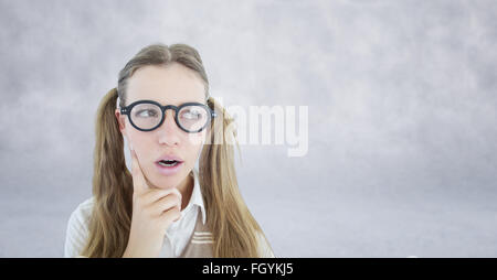 Composite image of female geeky hipster looking confused Stock Photo