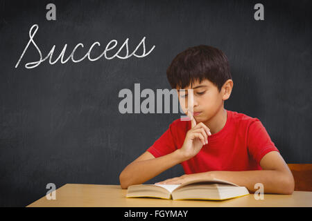 Success against blackboard Stock Photo