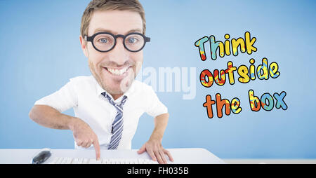 Composite image of geeky businessman typing Stock Photo