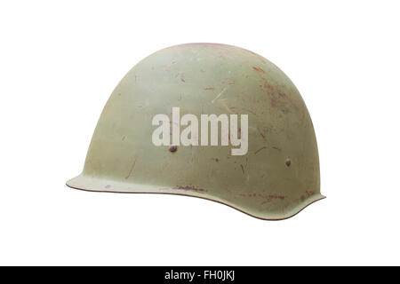 Old military helmet from Second World War with scratches and rust. Isolated on white, clipping path included. Stock Photo