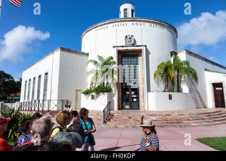 Miami Beach Florida,Washington Avenue,13th Street Post Office,exterior,outside exterior,Art Deco Federal,adult adults,woman female women,guide,speakin Stock Photo