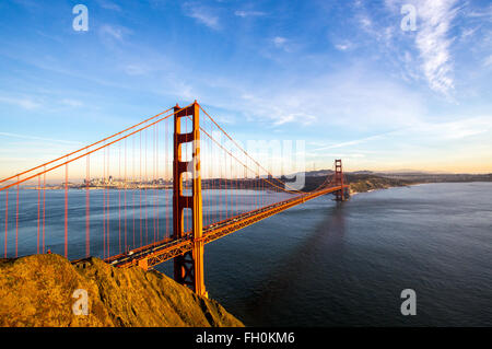 Sunny blue skies over the San Francisco skyline with the iconic Golden Gate Bridge Stock Photo