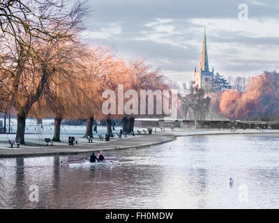 Morning frost on the river Avon at Stratford, with Holy Trinity church in the centre. Stock Photo