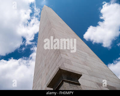 Bunker Hill Monument pointing towards a white reflection in the sky, a sign of hope and freedom Stock Photo