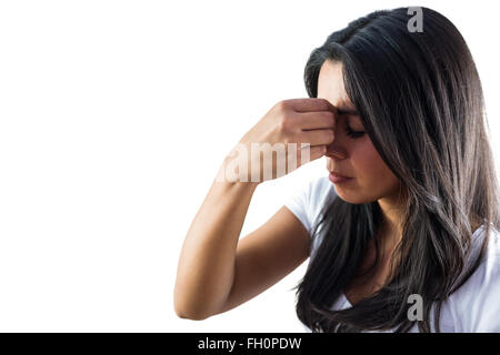 Woman pinching the bridge of her nose Stock Photo