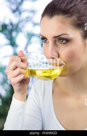 Woman drinking herbal tea Stock Photo