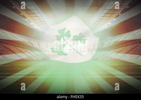 Composite image of flag of the irfu with the centenary logo Stock Photo