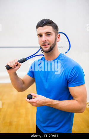 Man eager to play some squash Stock Photo