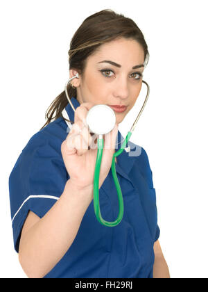 Young Female Doctor Or Physician Dealing With The Coronavirus Or Covid-19 Pandemic, Alone In Uniform, Isolated On White Stock Photo