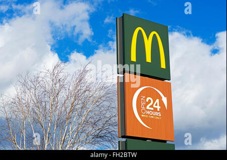 Sign for 24-hour branch of McDonalds, England UK Stock Photo