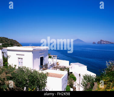 Panarea island, holiday houses, view to vulcano Stromboli , Aeolian Islands, Sicily, Italy, Europe Stock Photo